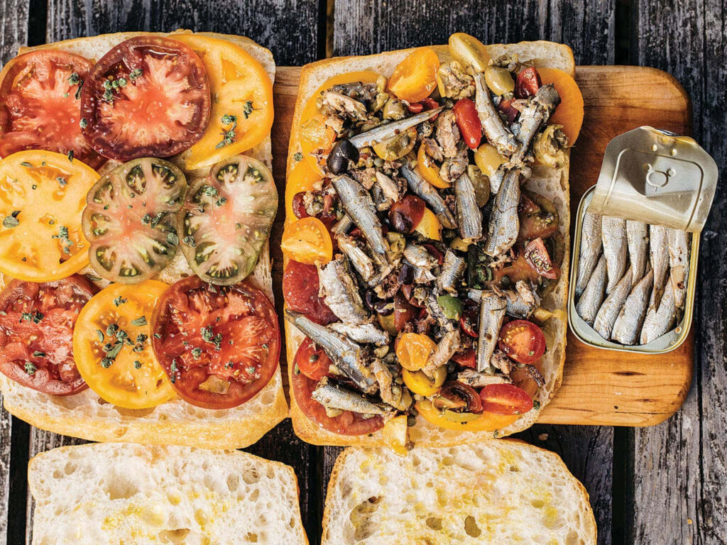 Rustic Gourmet Wallpaper: Fresh Tomatoes & Sardines on Bread