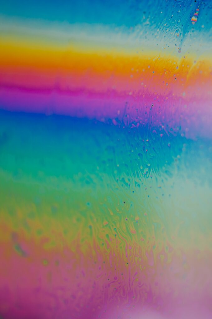 Vibrant Rainbow Gradient Wallpaper with Captivating Texture