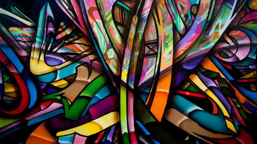 Vibrant Street Art: A Captivating HD Wallpaper of Colorful Graffiti