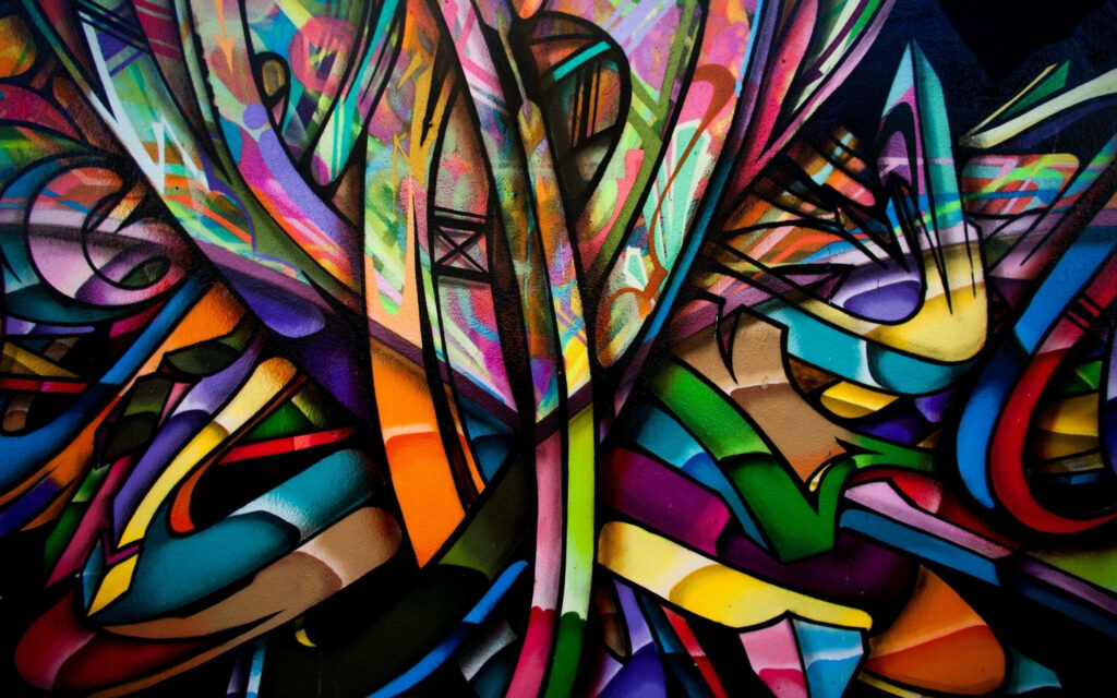 Vibrant Graffiti-Style Wallpaper for a Dynamic Laptop Background
