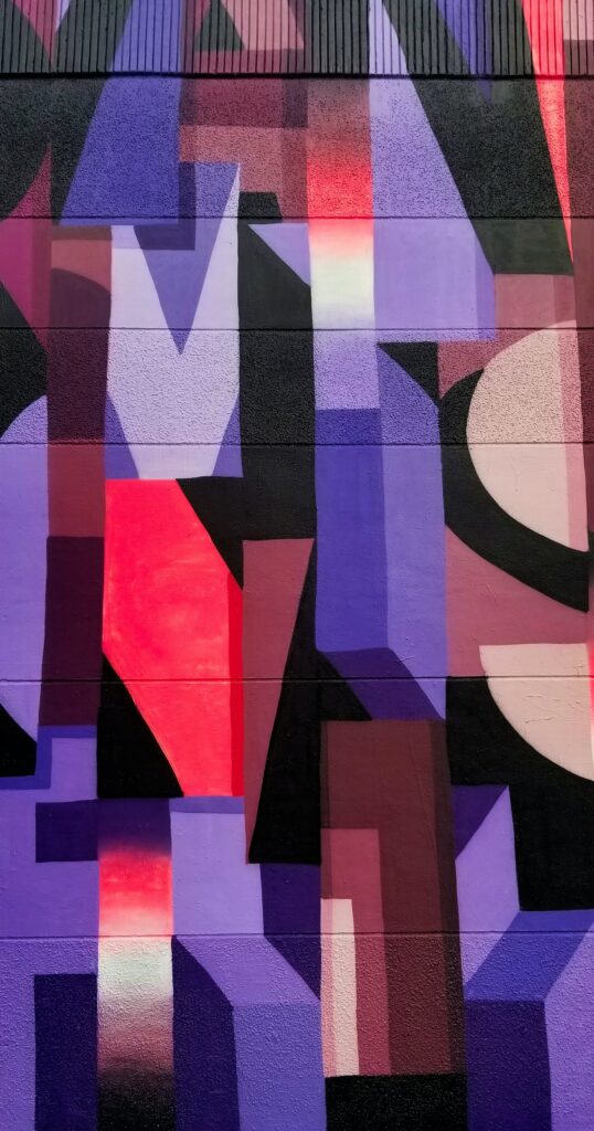Vibrant Graffiti Wallpaper with Bold Shapes in Purple, Red & Black