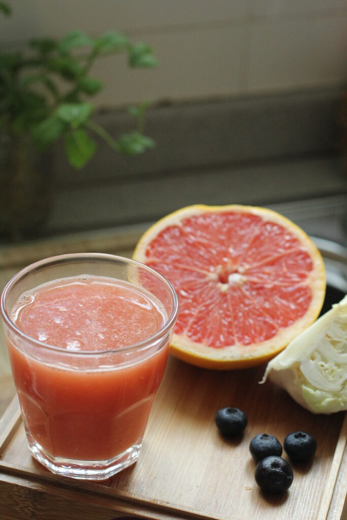 Vibrant Grapefruit Juice Wallpaper: Fresh, Healthy & Colorful Background
