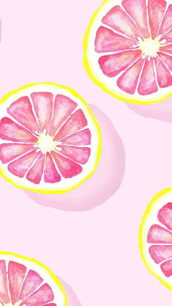 Vibrant digital wallpaper with artistic pink grapefruit slices on soft pink minimalist background