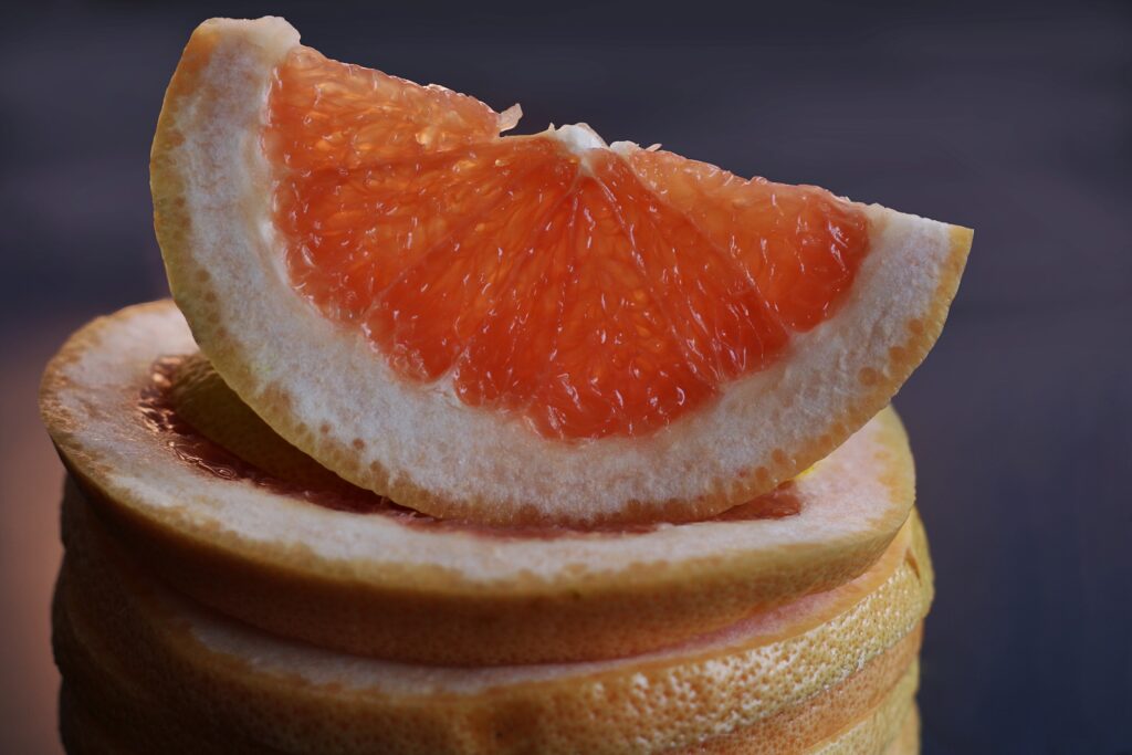 Vibrant Grapefruit Close-Up Wallpaper: Juicy Freshness Background