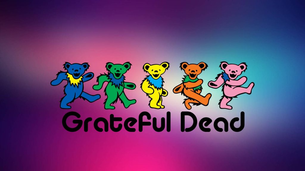 Vibrant Grateful Dead wallpaper with colorful Dancing Bears and logo on purple blue background