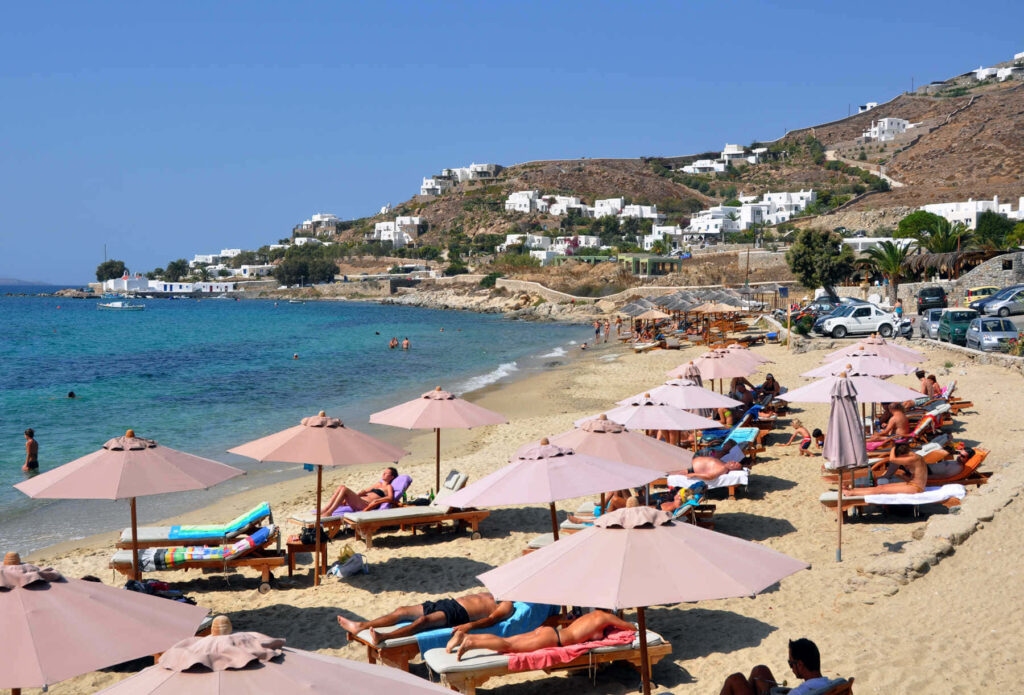 Vibrant Greek Beach Wallpaper: Azure Waters & Golden Sands Paradise