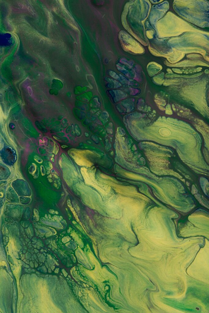 Vibrant Green Abstract Wallpaper with Fluid Patterns and Textures