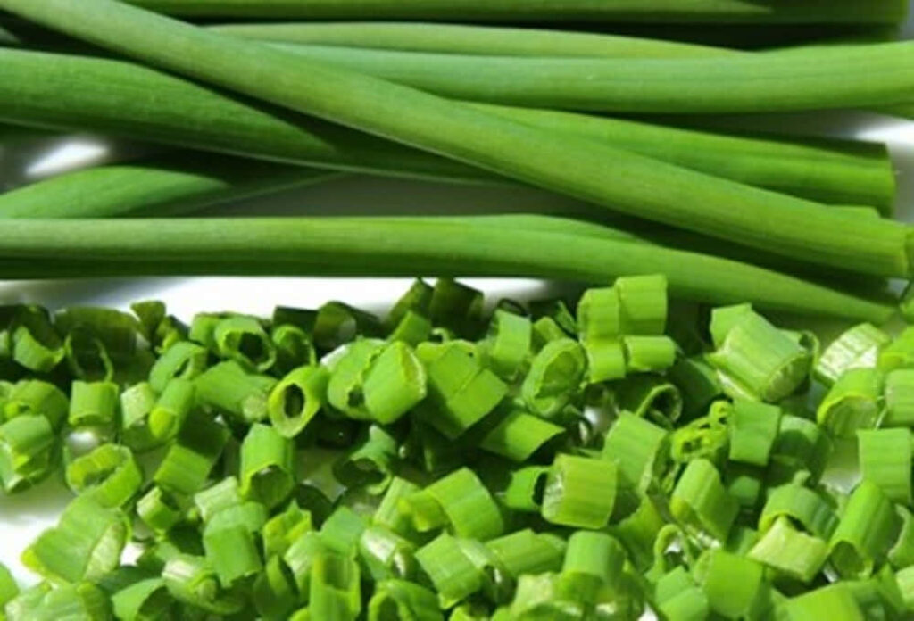 Vibrant Green Chives Wallpaper: Fresh & Textured Background