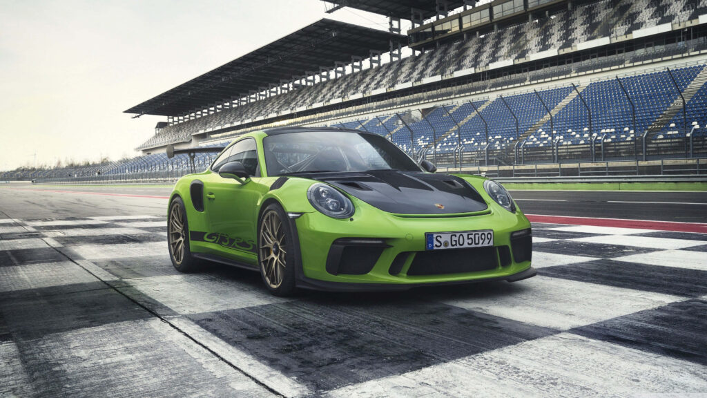 Vibrant Green Porsche GT3 RS Wallpaper on Racetrack Background
