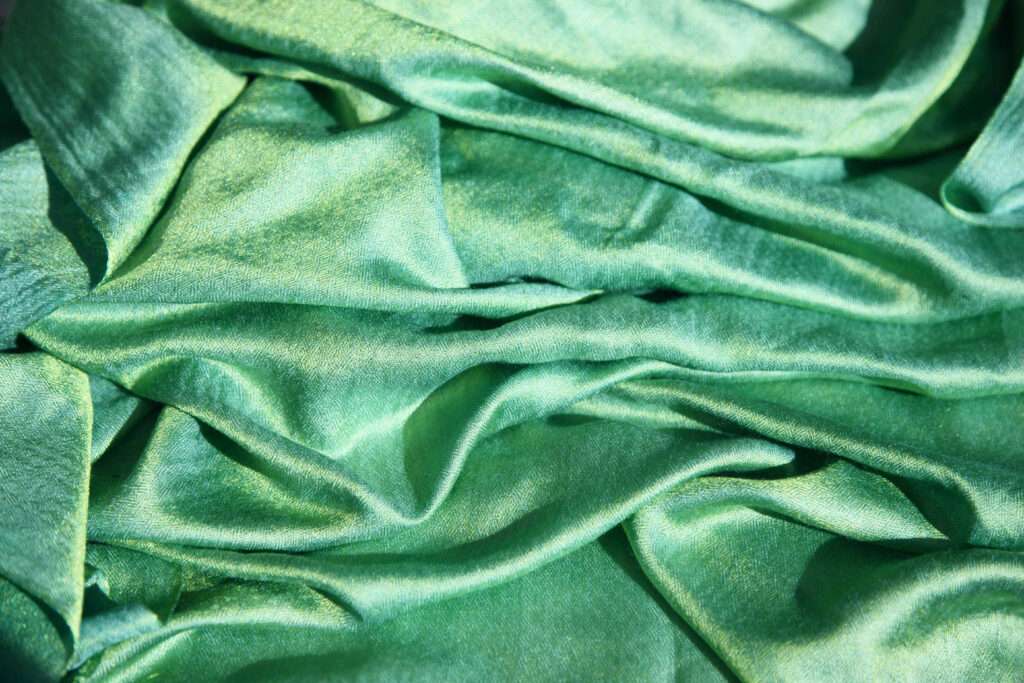 Vibrant Green Silk Fabric Texture Wallpaper with Glossy Folds