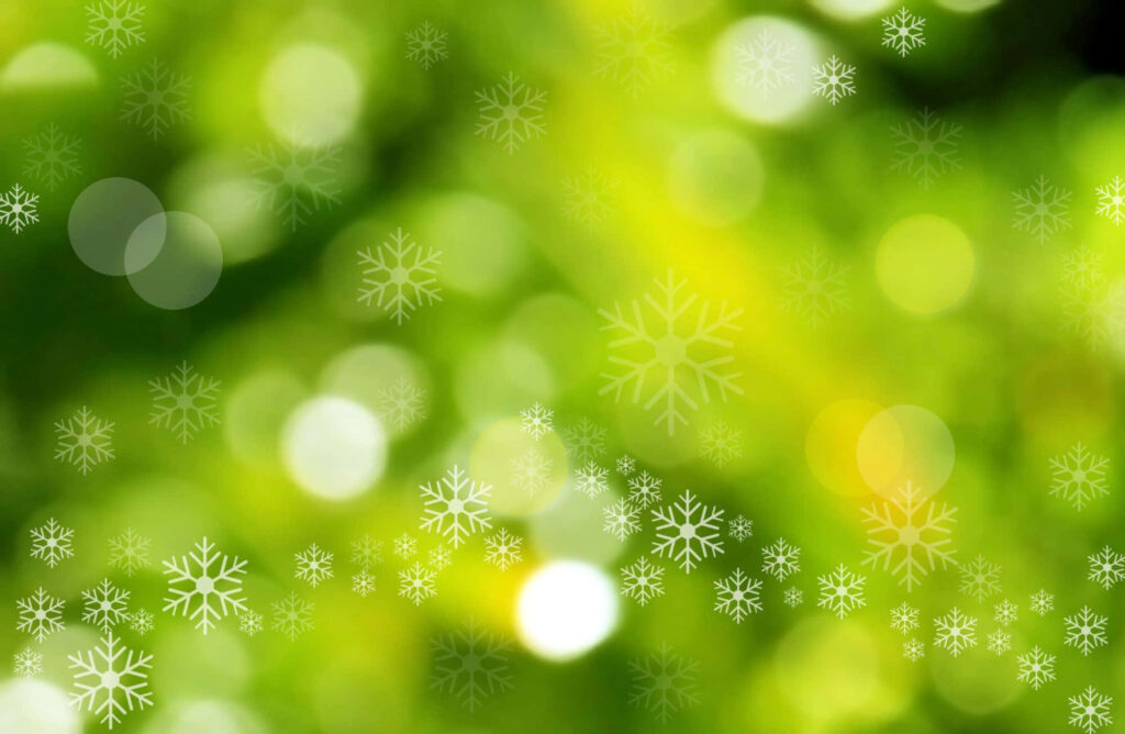 Festive Green Snowflake Wallpaper with Dreamy Bokeh Background