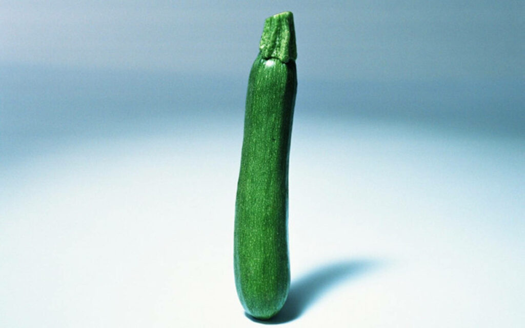 Vibrant Green Zucchini Close-Up Wallpaper: Natural Texture Detail