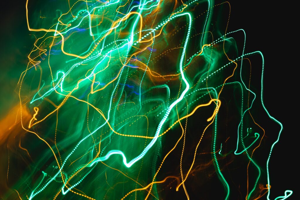 Dynamic Green & Yellow Lines Abstract Wallpaper - High-Res Background