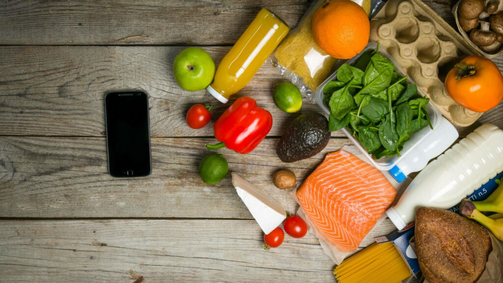 Vibrant Grocery Wallpaper: Fresh Fruits & Vegetables on Rustic Wood