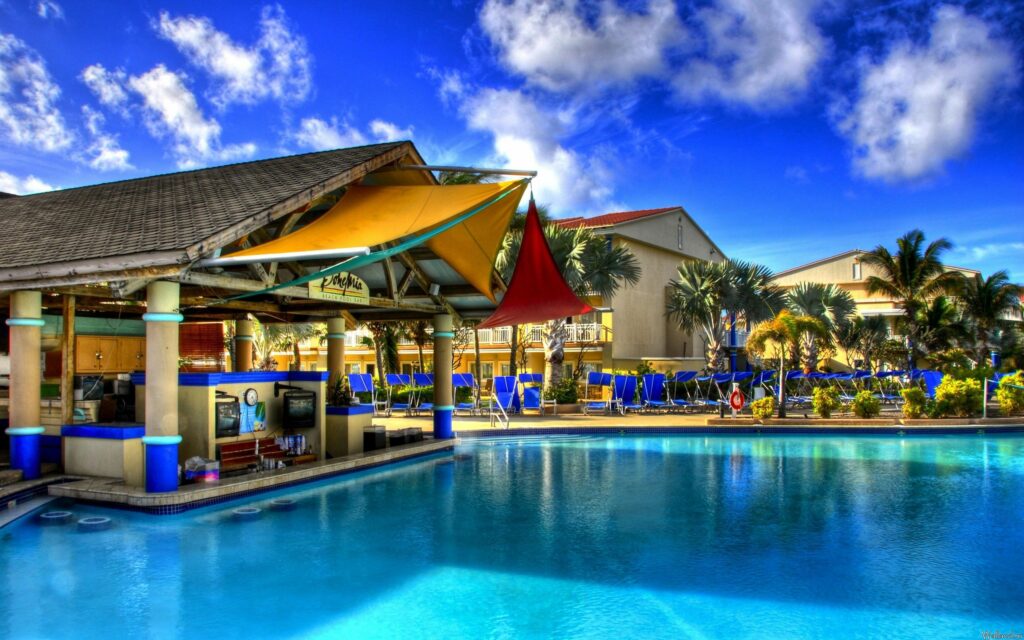 Vibrant Tropical Poolside HDR Wallpaper - Relaxing Getaway Scene
