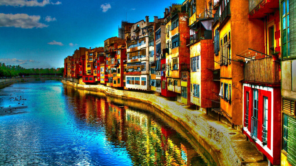 Tuscany Bliss: Vibrant HDR Wallpaper of Colorful Buildings & River