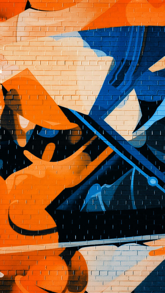 Vibrant Urban Art: A Colorful Graffiti Wallpaper for Your iPhone