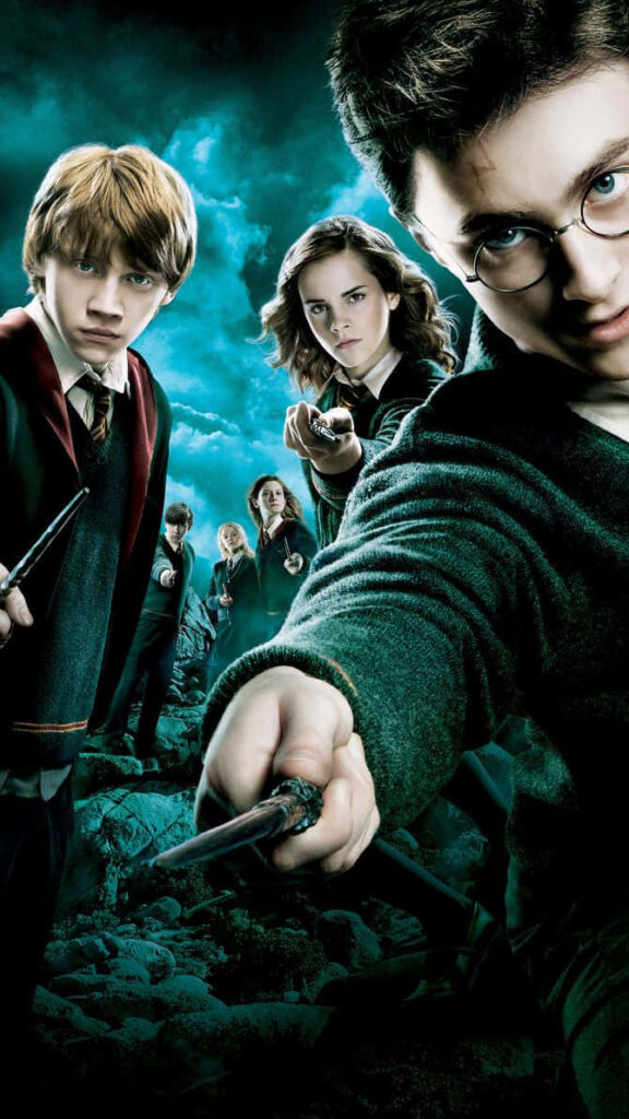 Magical Harry Potter Wallpaper: Iconic Trio in Dramatic Pose