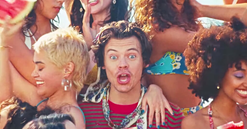Colorful Harry Styles Wallpaper: Vibrant Energy with Joyful Fans