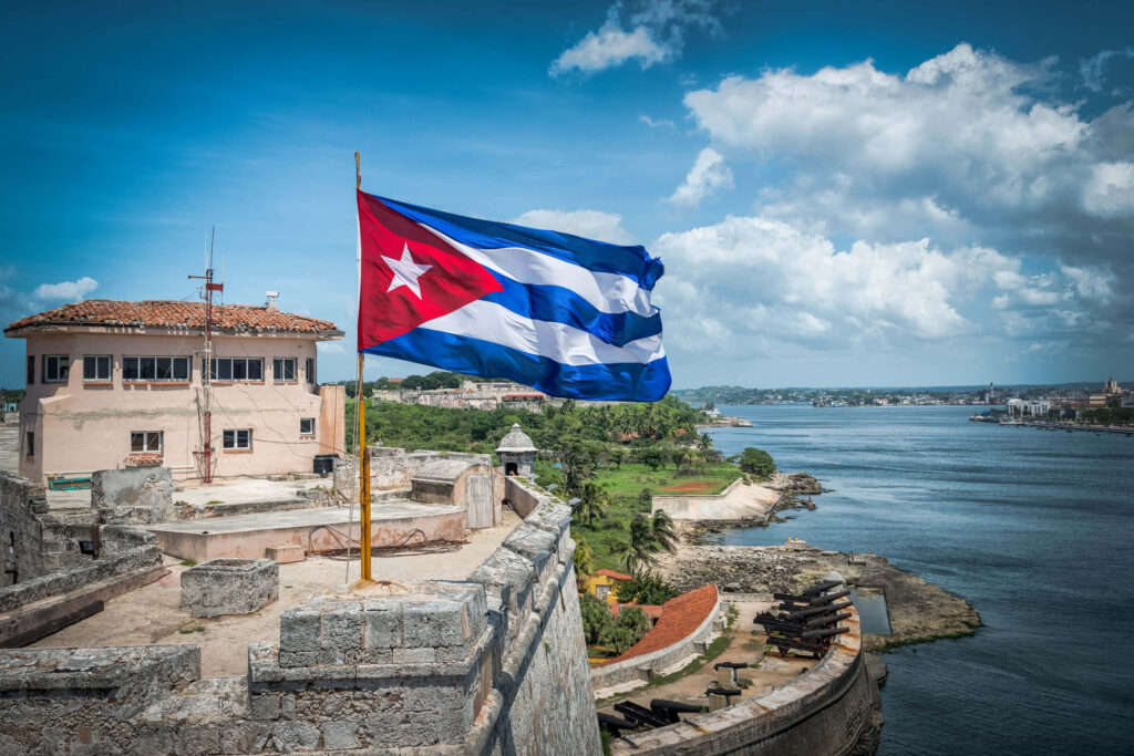 Scenic Havana, Cuba: Vibrant Architecture & Coastal Fort Wallpaper