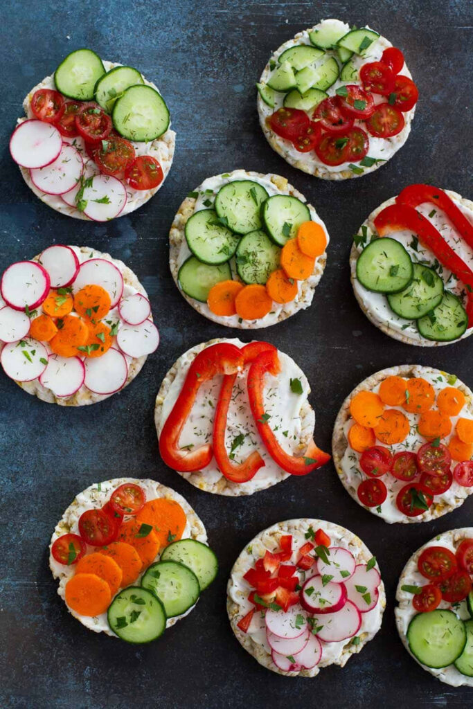 Vibrant Healthy Food Wallpaper: Colorful Veggies on Rice Cakes
