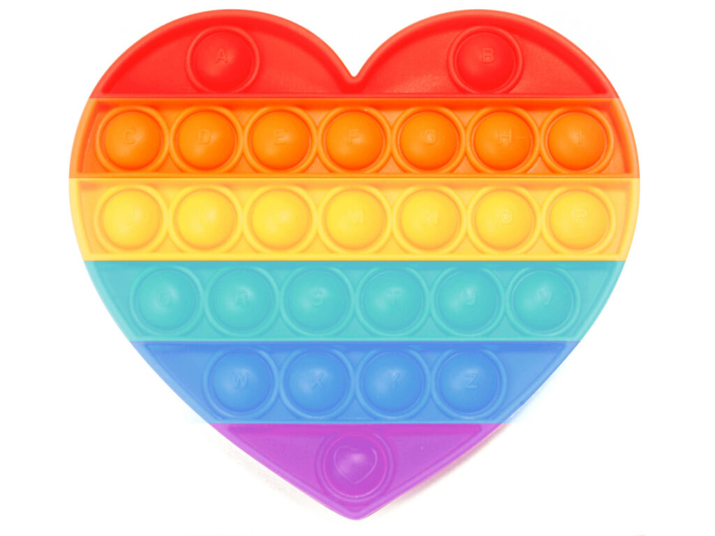 Vibrant Heart-Shaped Pop It Toy Wallpaper with Rainbow Gradient