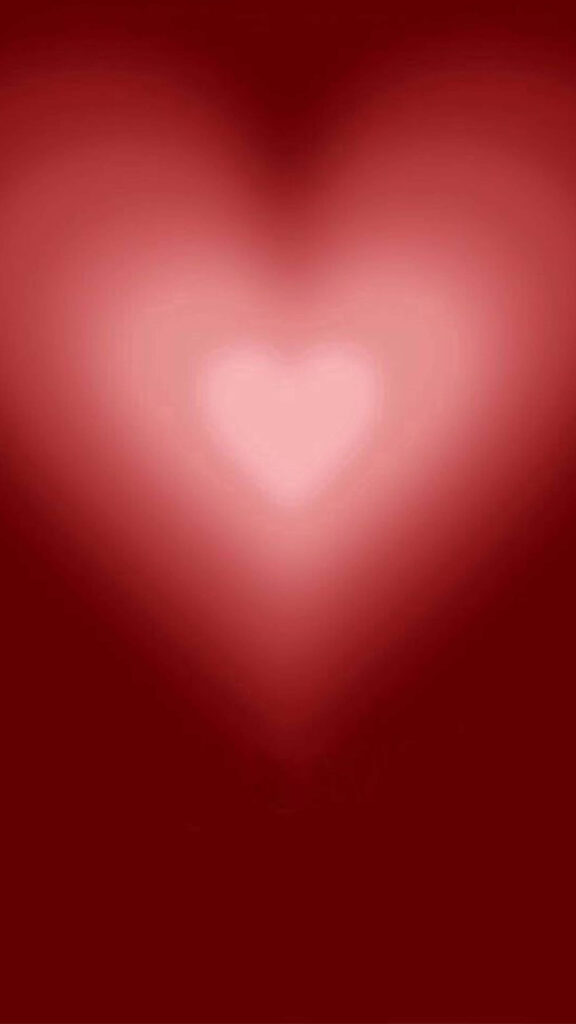 Vibrant Heart-Shaped Wallpaper: Warm Red Background Design