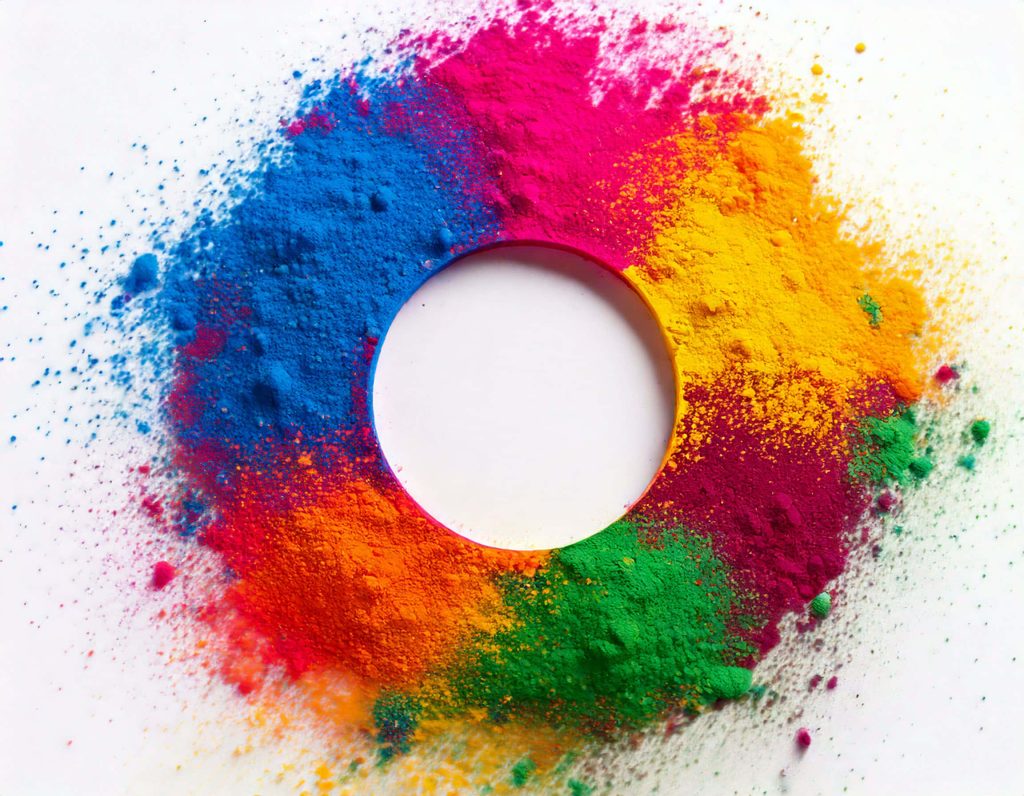 Vibrant Holi festival colors blue pink yellow orange green powders arranged in circle on white background Wallpaper