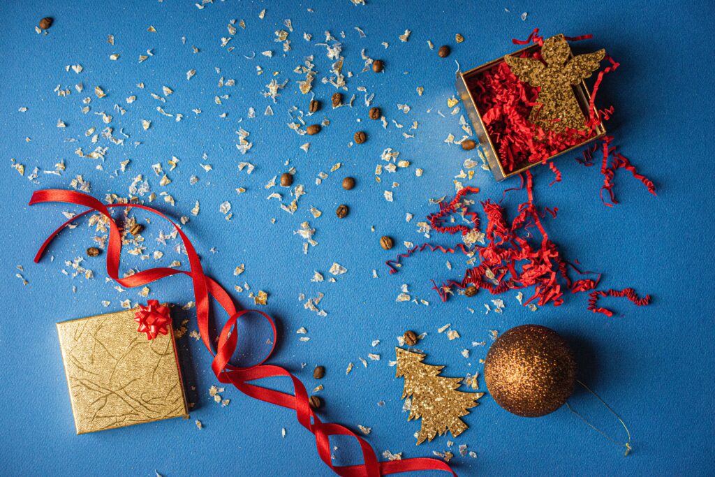 Vibrant Holiday Wallpaper with Golden Gift Box & Festive Decor