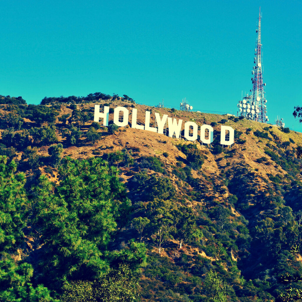 Hollywood Sign Wallpaper: Vivid Blue Sky & Lush Greenery Background