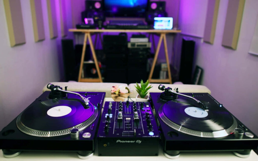 Vibrant Home Studio Wallpaper: DJ Turntables & Mixer in Purple Light