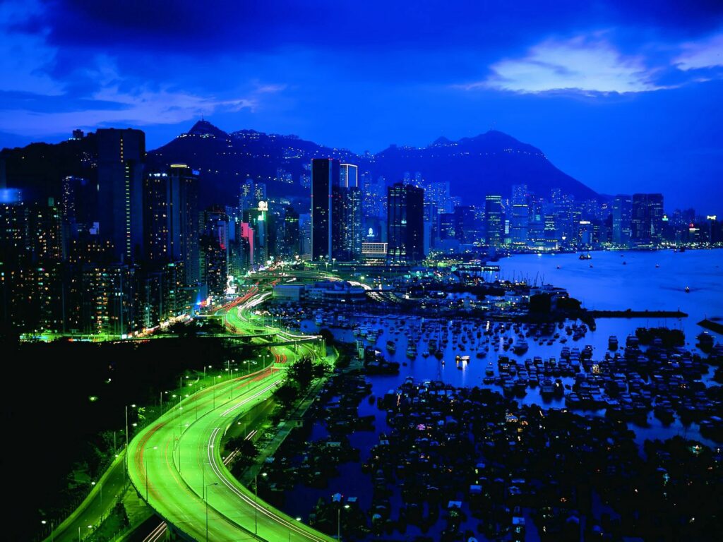Vibrant Hong Kong Night View Wallpaper - Glowing Urban Landscape