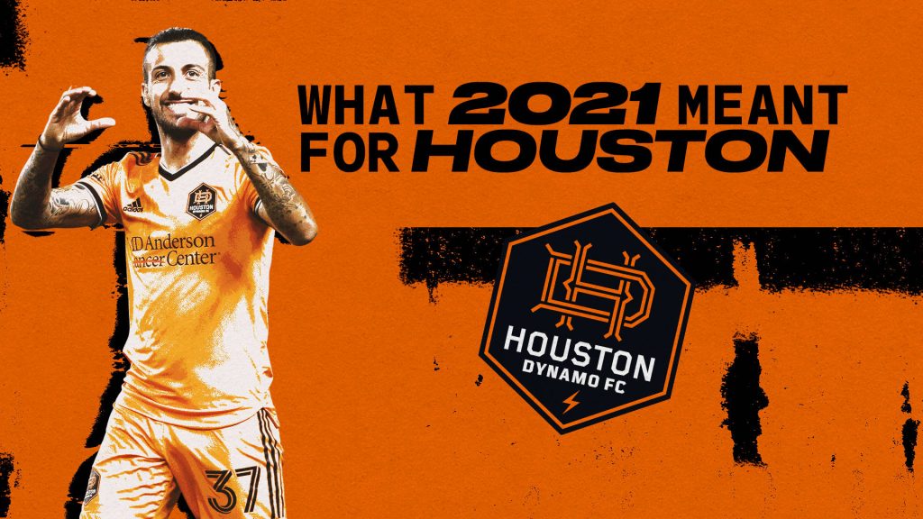 Houston Dynamo FC player in orange kit with hexagonal crest and grunge background wallpaper