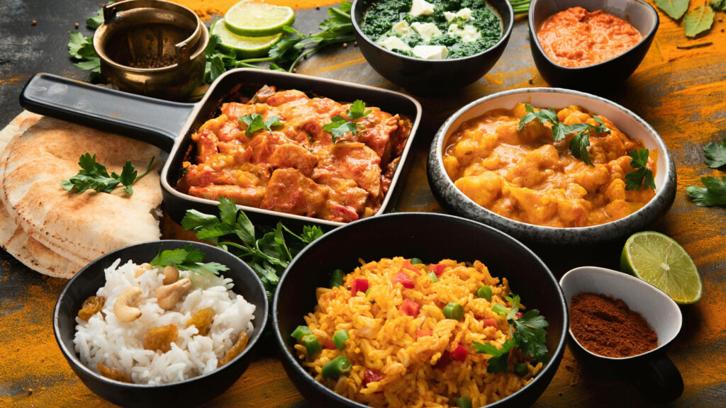 Colorful Indian Dishes Wallpaper - Feast for the Eyes Background