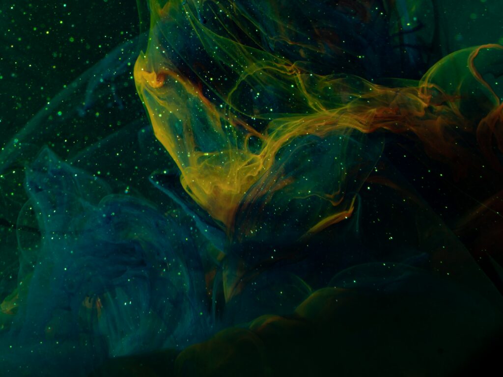 Vibrant Ink and Paint Swirl: Ethereal Liquid Background Wallpaper