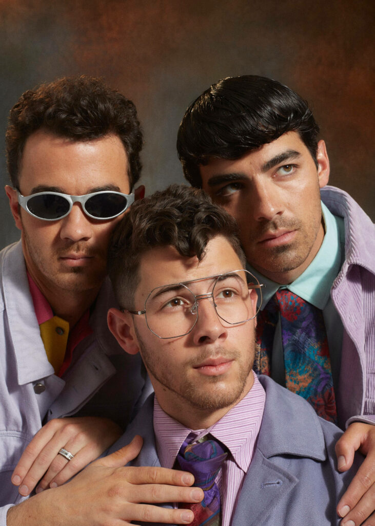 Vibrant Jonas Brothers Wallpaper: Unique Styles & Playful Vibes