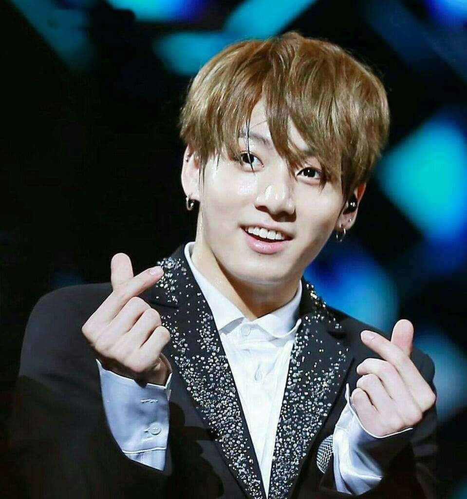 Charming Jungkook BTS Wallpaper: Iconic Finger Heart Gesture