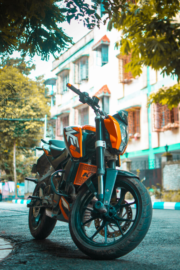 Vibrant KTM Duke 200 Motorcycle Wallpaper - Urban Adventure Vibes