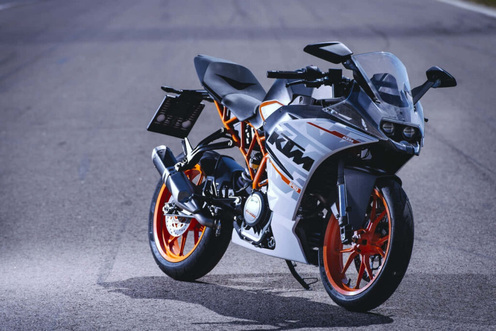 Sleek KTM Motorcycle Wallpaper: Speed, Style & Vibrant Orange Accents