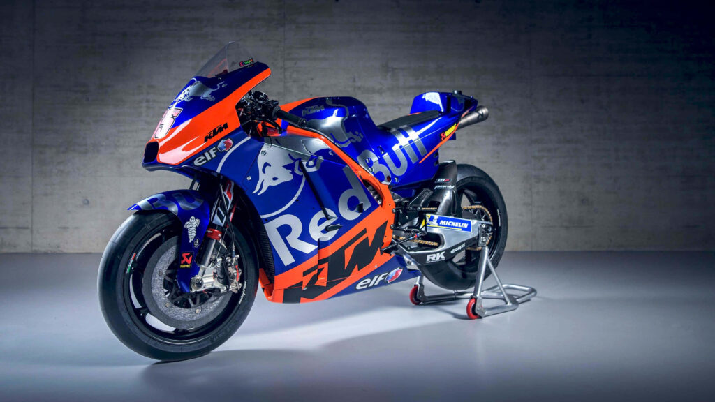 Vibrant KTM Racing Motorcycle Wallpaper with Bold Red Bull Design