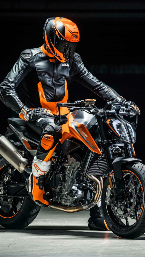 Thrilling Black & Orange KTM Rider iPhone Wallpaper - Speed & Power