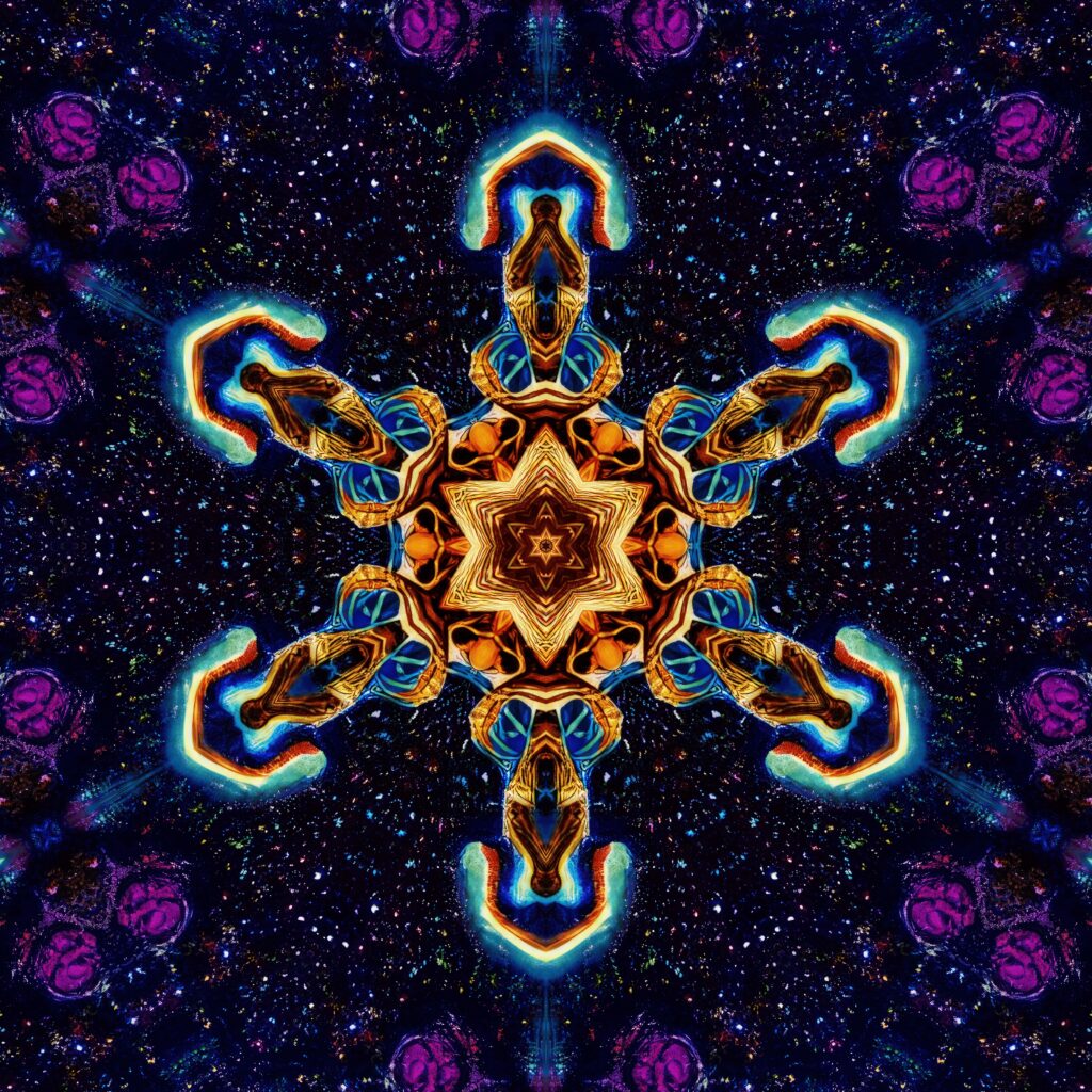 Vibrant Kaleidoscopic Wallpaper: Glowing Shapes & Colorful Patterns