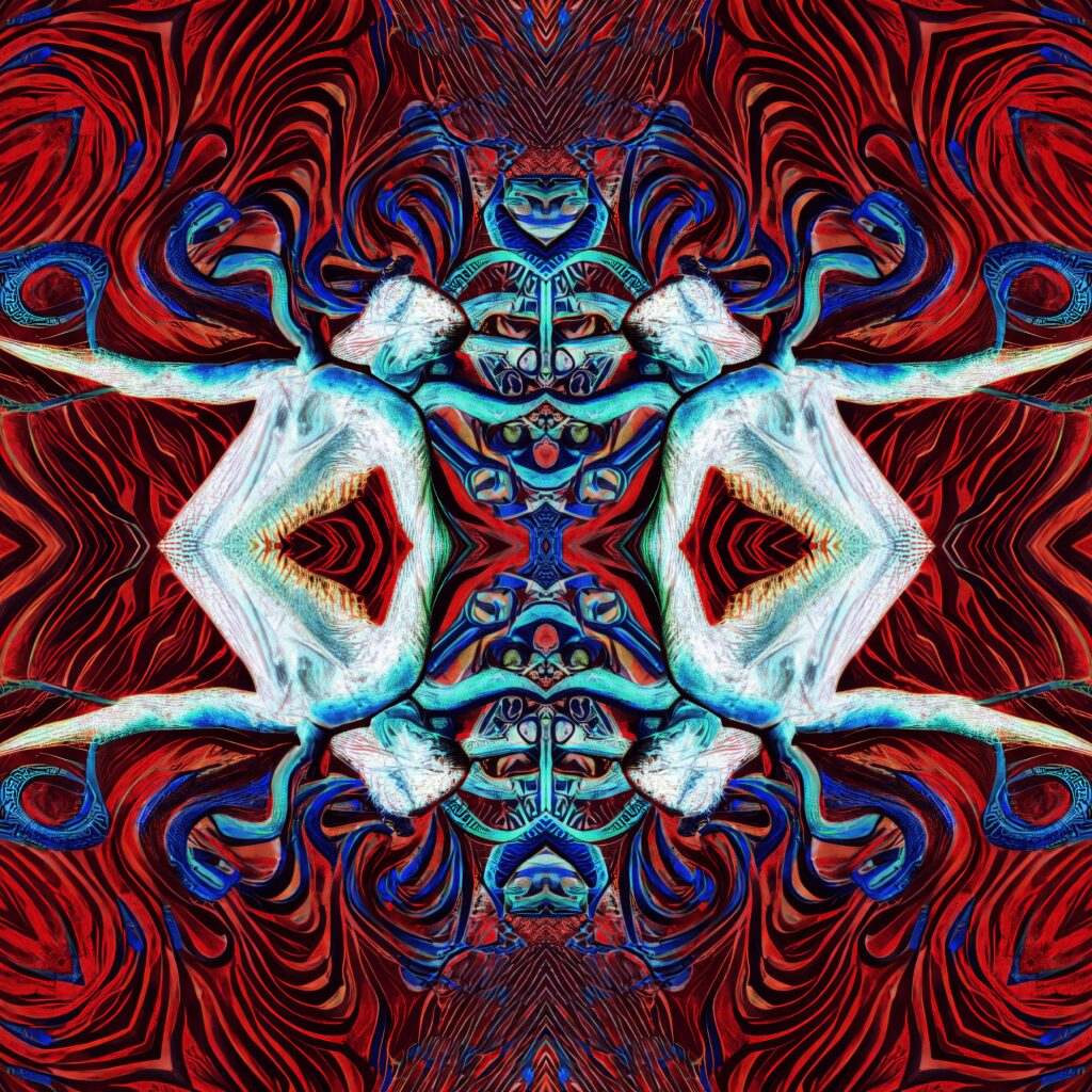 Vibrant Kaleidoscopic Wallpaper: Red, Blue & Teal Abstract Design
