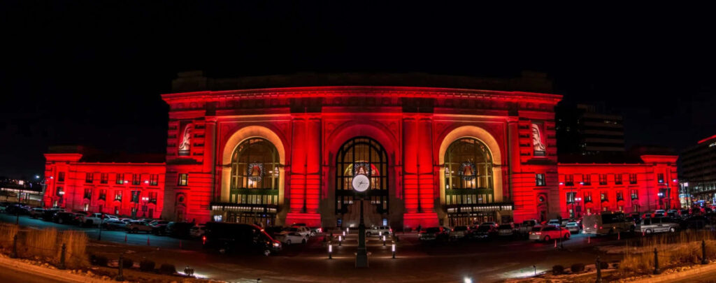 Illuminated Kansas City Station Building at Night - Vibrant Wallpaper