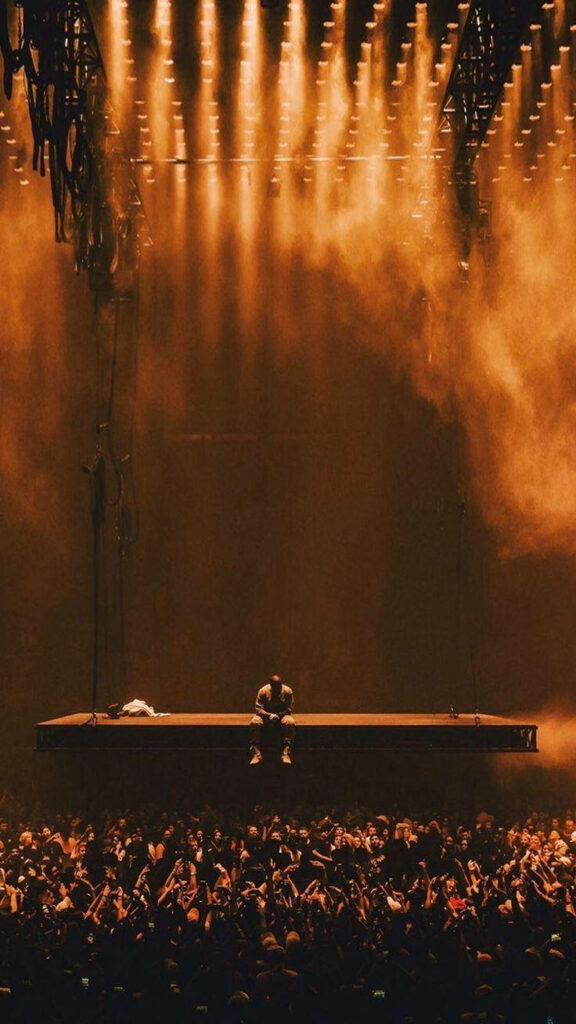 Vibrant Kanye West Concert Wallpaper: Electrifying Stage Scene