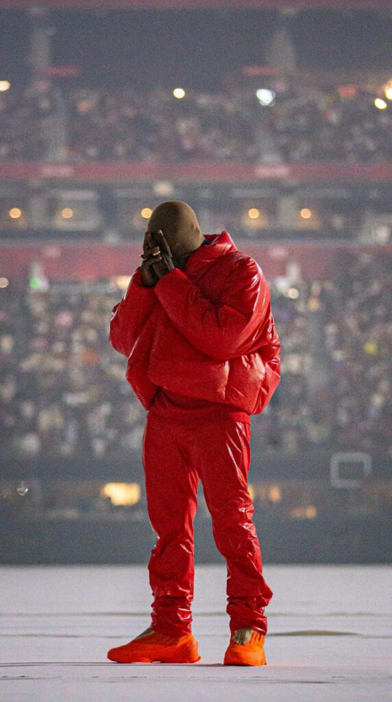 Bold Kanye West Wallpaper in Red Tracksuit for Android Devices