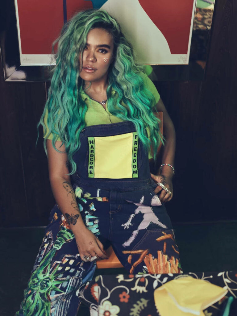 Karol G Vibrant Wallpaper: Turquoise Hair & Trendy Style Background