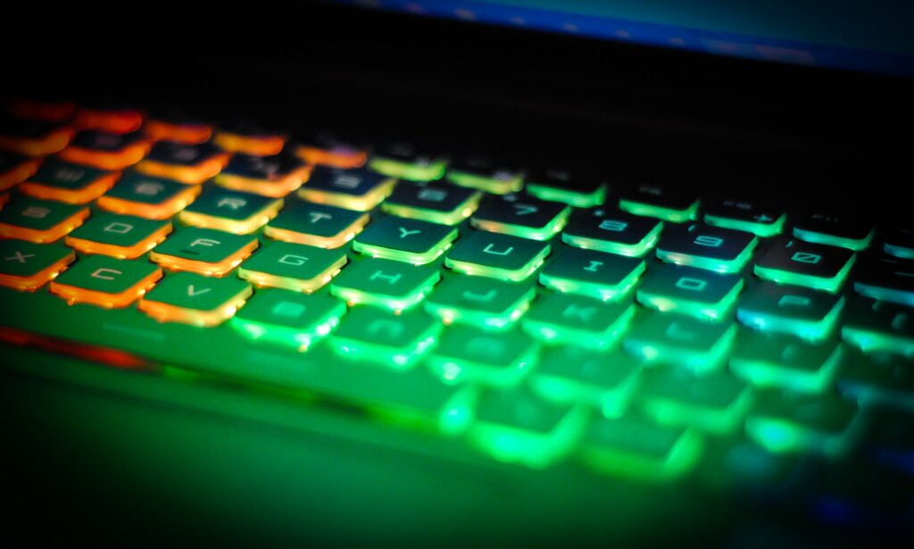 Futuristic Neon Keyboard Wallpaper: Vibrant Gradient Backlighting