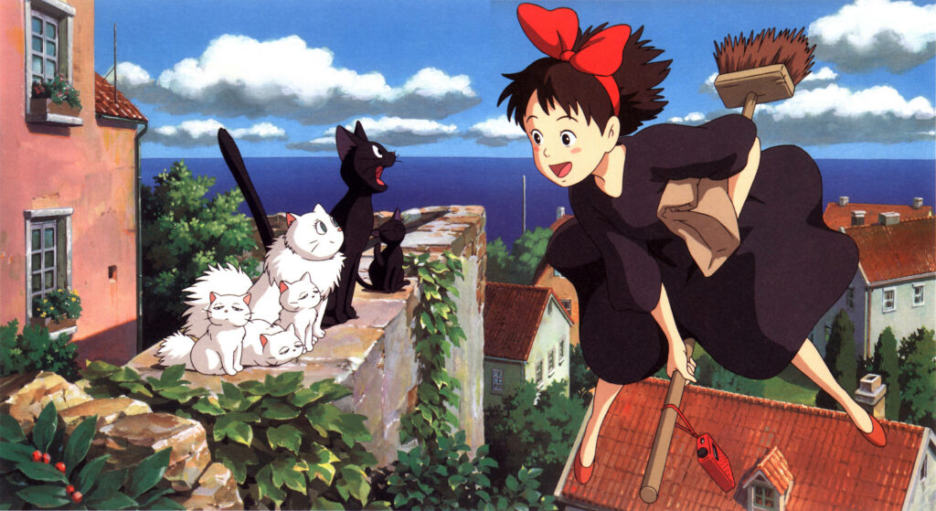 Charming Kiki's Delivery Service Wallpaper with Cats and Townscape