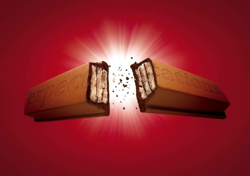 Vibrant Kit Kat Bar Breaking Wallpaper - Shattering Expectations